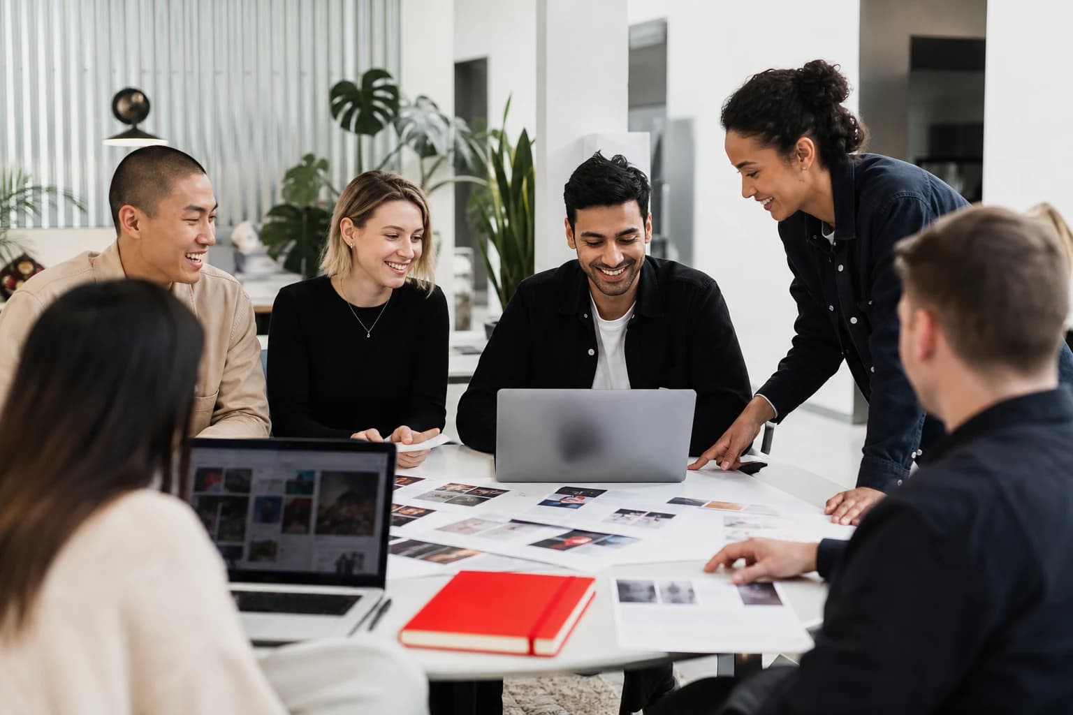 Digital i360 team collaborating in the office